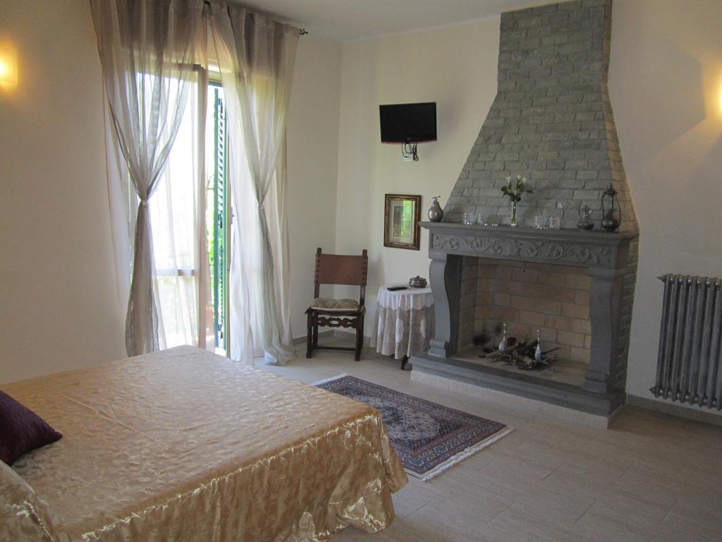 سارزانا B&B Al Calcandola الغرفة الصورة