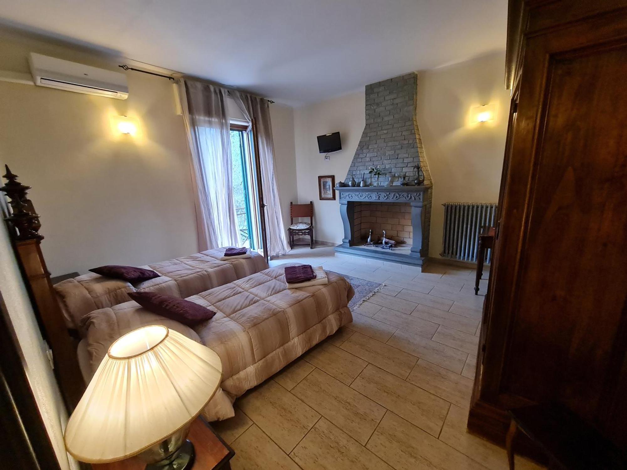 سارزانا B&B Al Calcandola الغرفة الصورة
