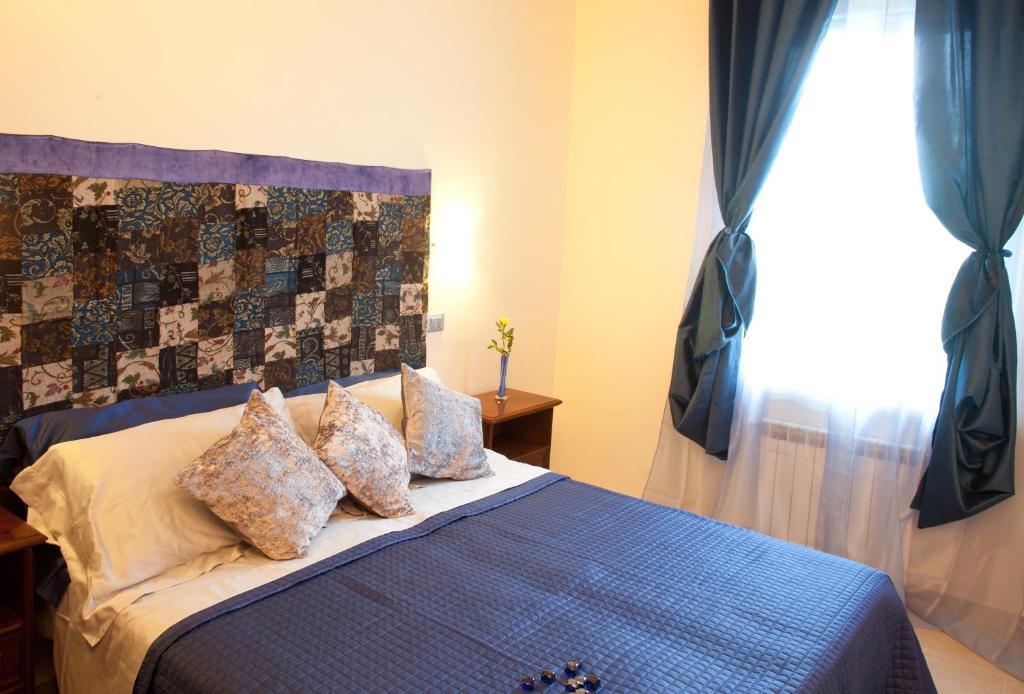 سارزانا B&B Al Calcandola الغرفة الصورة