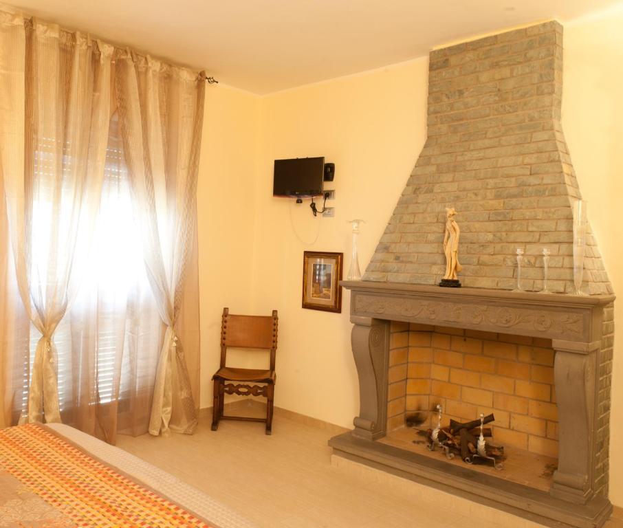 سارزانا B&B Al Calcandola الغرفة الصورة